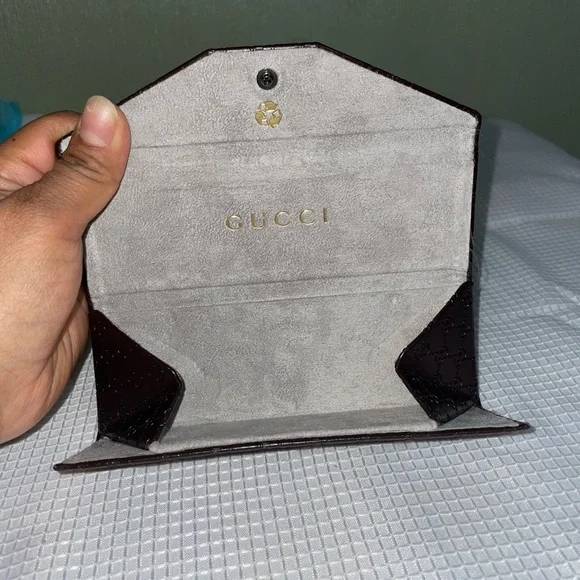 brown leather monogrammed foldable eyeglasses case from Gucci. - Picture 5 of 16